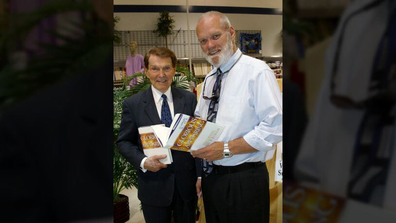 Co-authors of the 'Left Behind' series of religious books, Dr. Tim LaHaye (L) and Jerry B. Jenkins stop for a moment during their current book tour to display their latest book 'Glorious Appearance' at a book signing event April 4, 2004 at the WalMart Super Store in Bossier City, Louisiana. The duo has co-authored 12 Christian books about the second coming of Jesus Christ. (Photo by Mario Villafuerte/Getty Images)