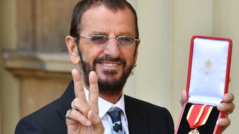 : Ringo Starr, real name Richard Starkey, poses at Buckingham Palace after receiving his Knighthood at an Investiture ceremony on March 20, 2018 in London, England.