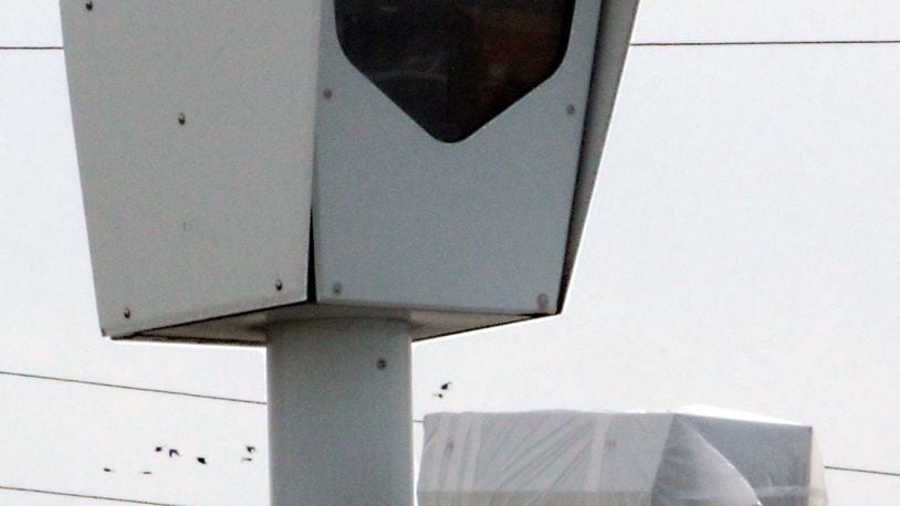Plastic bags cover the red light cameras at the intersection of Bechtle Avenue and Troy Road in Springfield. The cameras were turned off in 2015. Jeff Guerini/Staff