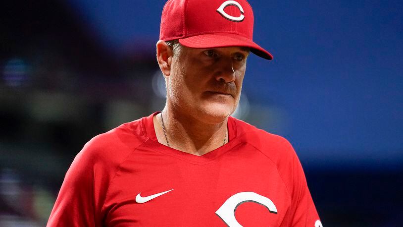 Cincinnati Reds manager David Bell walks to the dugout during the seventh inning of the second baseball game of a doubleheader against the Pittsburgh Pirates, Thursday, July 7, 2022, in Cincinnati. (AP Photo/Jeff Dean)