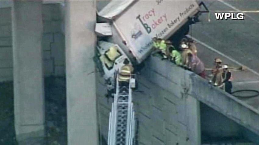 Truck dangles off I-95 overpass