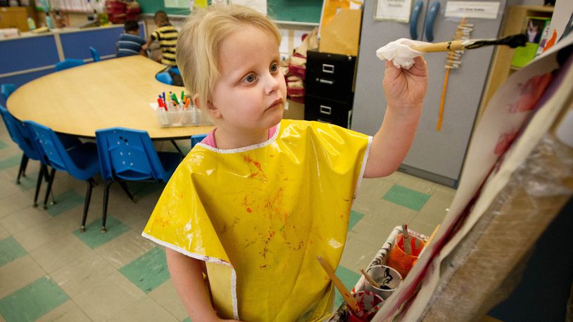 Archive photo: Head Start student Maryann Keydozius works on a painting at Immaculate Conception School, 2268 S. Smithville Road. Staff Photo by Jim Witmer.