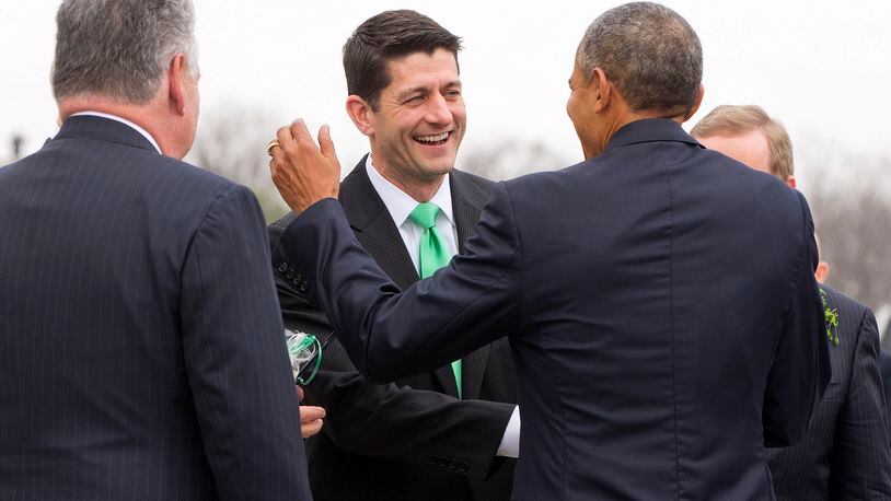 President Barack Obama, center, shares a laugh with House Speaker Paul Ryan of Wis., after walking down the steps of the Capitol in Washington, with from Rep. Peter King, R-N.Y., left, and Irish Prime Minister Enda Kenny, right. after attending a "Friends of Ireland" luncheon. (AP Photo/Pablo Martinez Monsivais)