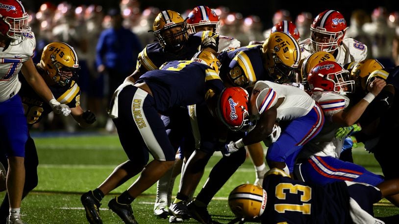 Springfield makes a tackle against Olentangy Orange on Friday, Oct. 28, 2022, at Springfield. David Jablonski/Staff