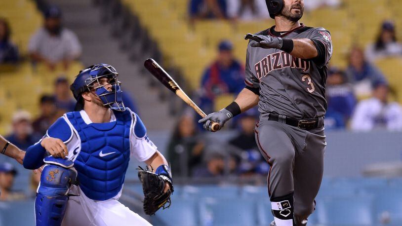 LOS ANGELES, CA - MAY 08: Daniel Descalso #3 of the Arizona Diamondbacks reacts to his three run homerun in front of Kyle Farmer #17 of the Los Angeles Dodgers, to take an 8-5 lead during the 12th inning at Dodger Stadium on May 8, 2018 in Los Angeles, California. (Photo by Harry How/Getty Images)