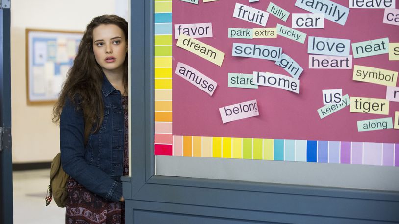 This image released by Netflix shows Katherine Langford in a scene from the series, "13 Reasons Why," about a teenager who commits suicide. The stomach-turning suicide scene has triggered criticism from some mental health advocates that it romanticizes suicide and even promoted many schools across the country to send warning letters to parents and guardians. The show’s creators are unapologetic, saying their frank depiction of teen life needs to be “unflinching and raw.” (Beth Dubber/Netflix via AP)