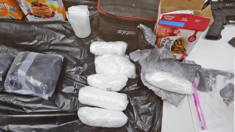 German Twp. Police recovered over four pounds of meth, two AK-47s with armour piercing ammunition and over $11 thousand when they arrested two individuals for shoplifting at Rural King in May 2021. BILL LACKEY/STAFF