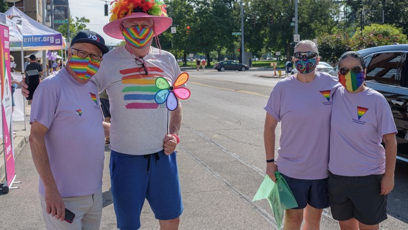 In August 2020, due to the pandemic, the annual Dayton Pride Parade, hosted by the Greater Dayton LGBT Center, was reinvented as a reverse parade where the spectators drove down East Second Street in downtown Dayton to view static displays set up by performers, sponsors and nonprofits. This year's parade will be held from 10 a.m. to 11 a.m. on Saturday. TOM GILLIAM/CONTRIBUTING PHOTOGRAPHER