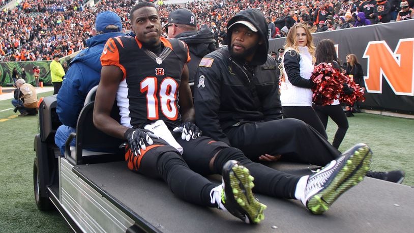 CINCINNATI, OH - NOVEMBER 20: A.J. Green #18 of the Cincinnati Bengals gets carted off of the field after being injured during the first quarter of the game against the Buffalo Bills at Paul Brown Stadium on November 20, 2016 in Cincinnati, Ohio. (Photo by John Grieshop/Getty Images)