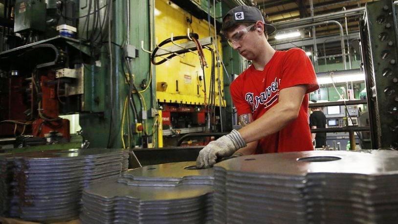 Some local manufacturers say that while the federal tax overhaul has helped their bottom lines, they are feeling the pinch of the trade war with China and are worried about another looming round of tariffs.