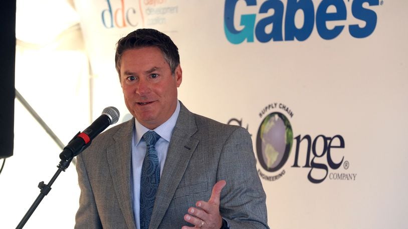 Mike McDorman, president and CEO of the Greater Springfield Partnership, speaks during a groundbreaking ceremony for the new Gabe's distribution center in this 2021 file photo. BILL LACKEY/STAFF