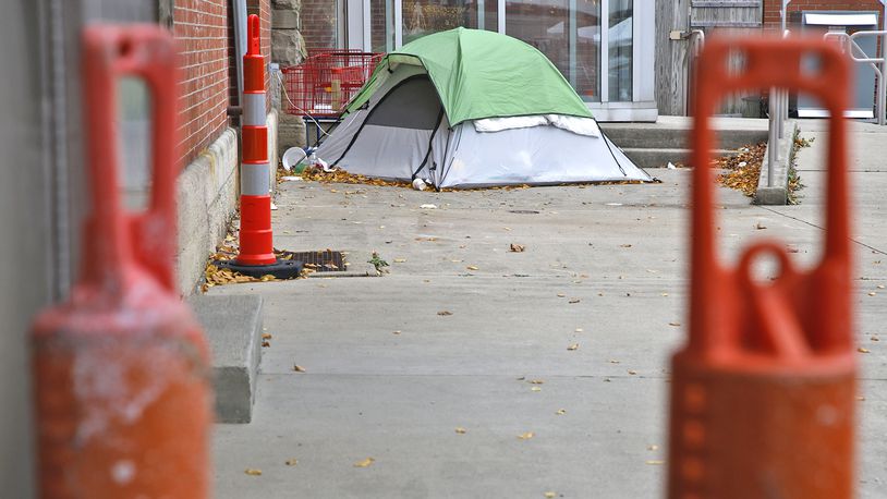 A tent is pitched along the north side of the Clark County Heritage Center Monday, Nov. 27, 2023 for a homeless person trying to find shelter from the cold. BILL LACKEY/STAFF