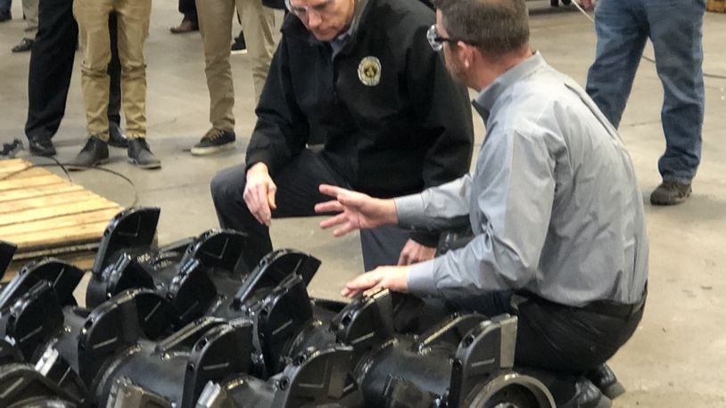 Sen. Rob Portman toured Fecon manufacturing facilities in Lebanon on Friday before answering question about the impeachment trial of President Donald Trump. STAFF/LAWRENCE BUDD