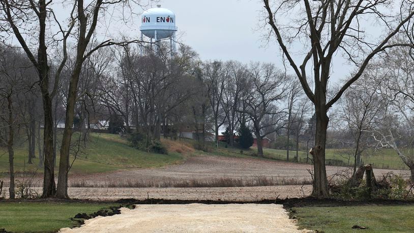A gravel road has recently been created to provide access through the Enon Community Park to the field where the proposed sports park will be located.  BILL LACKEY/STAFF