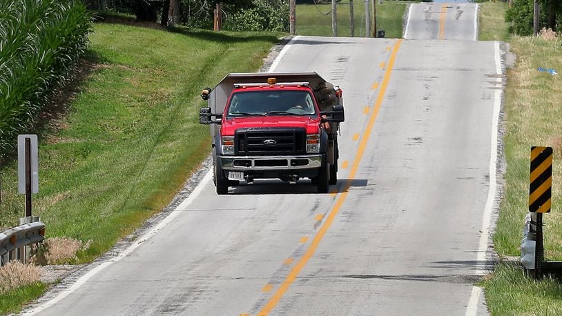 A truck travels down a stretch of Broadgauge Road Tuesday. A four-mile section of Broadgauge is scheduled to by resurfaced by Clark County this year. Bill Lackey/Staff