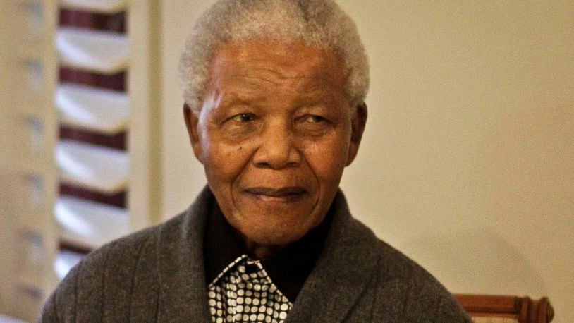 This July 18, 2012 file photo shows former South African President Nelson Mandela during the celebration of his 94th birthday in Qunu, South Africa. AP Photo.