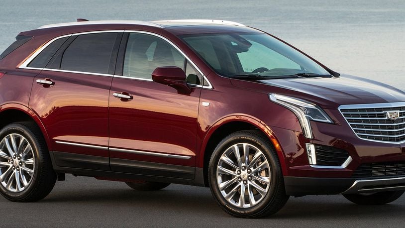 The 2018 Cadillac XT5 crossover includes a rear camera mirror, Apple CarPlay and Android Auto compatibilities, auto-heated steering wheel and front- and rear-seat USB capabilities. Cadillac photo