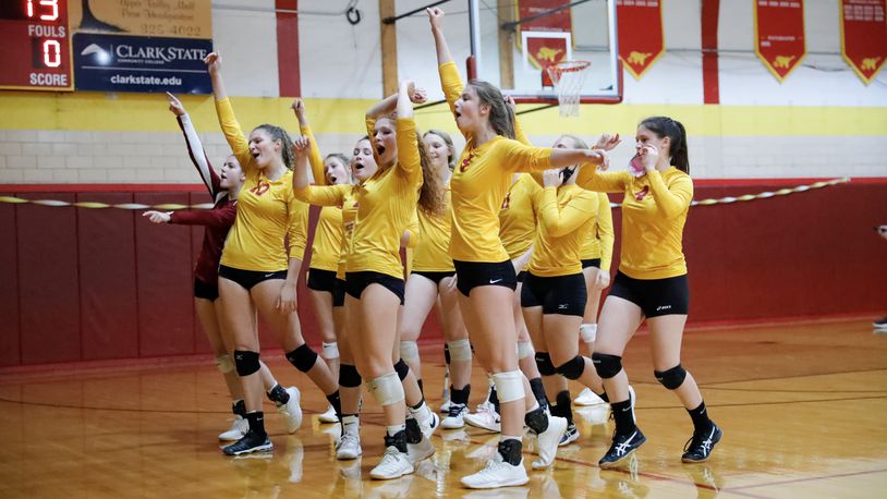 The Northeastern High School volleyball team celebrates after completing a perfect 21-0 regular season after beating Mechanicsburg on Thursday, Oct. 15. The 21-0 Jets are ranked No. 13 in Division III. CONTRIBUTED PHOTO BY MICHAEL COOPER