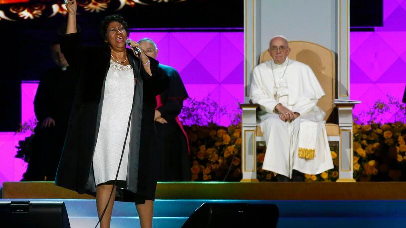 American singer Aretha Franklin sings as Pope Francis and others listen during the World Meeting of Families festival in Philadelphia, Saturday, Sept. 26, 2015. (Tony Gentile/Pool Photo via AP)