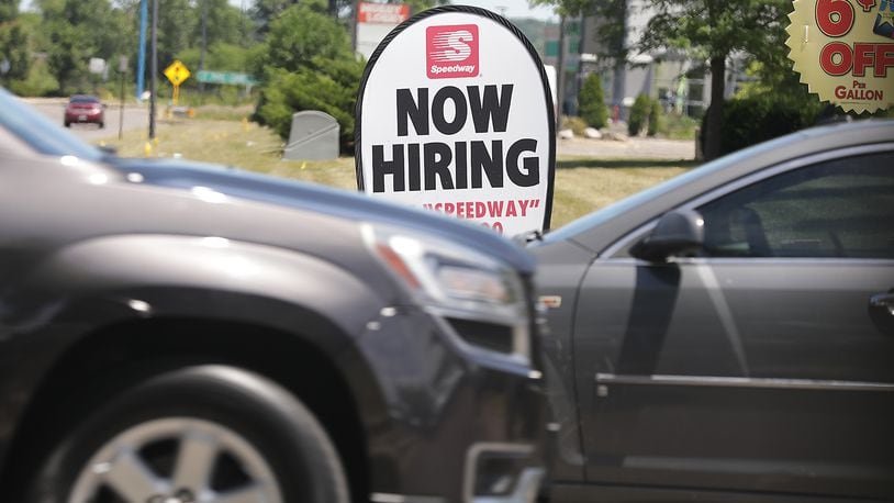 Signs advertising job openings in the Springfield area still dot the roadways and business fronts Tuesday, June 28, 2022. BILL LACKEY/STAFF