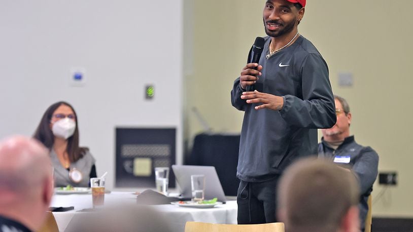 Springfield native and former Ohio State quarterback Braxton Miller talks to the Springfield Rotary Club about helping local kids through the The Braxton Miller Foundation Monday. BILL LACKEY/STAFF