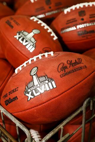 PHOTOS: How are official Super Bowl footballs made?