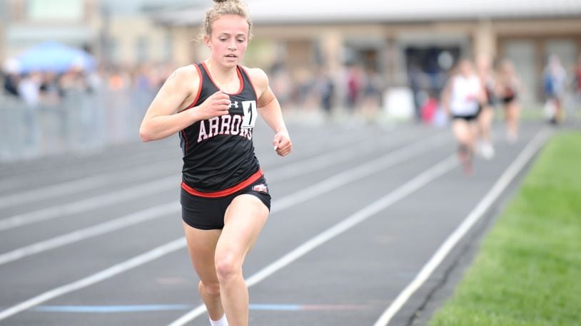 Tecumseh junior Kylee Mastin approaches the finish line in the 1,600-meter run with the field behind her at the Central Buckeye Conference championships Tuesday at Northwestern High School. Greg Billing / Contributed