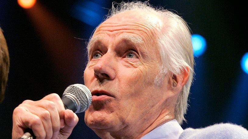 In this May 24, 2006, file photo, Beatles producer Sir George Martin answers a question from the media after the sneak preview of a new Beatles-themed Cirque du Soleil show, "Love," in Las Vegas on Wednesday, May 24, 2006. George Martin, the producer who guided the Beatles to astounding heights, has died, his manager said on March 9, 2016. He was 90.