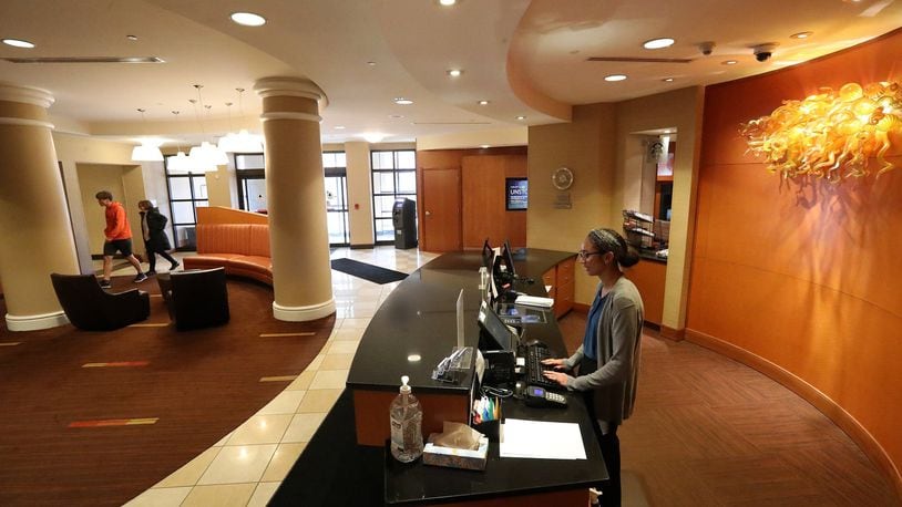 Kylah Smith works at the front desk at the Courtyard by Marriott in Springfield. BILL LACKEY/STAFF