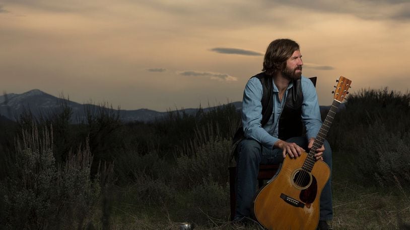 Shawnee High School graduate Michael Shaw has released his first album of outlaw country songs, inspired by his life experiences living in Montana.