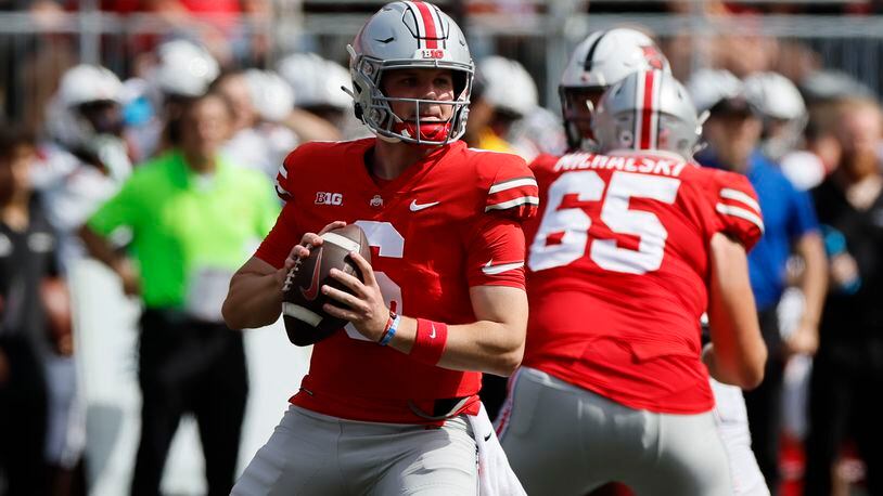Ohio State quarterback Kyle McCord drops back to pass against Arkansas State during the second half of an NCAA college football game Saturday, Sept. 10, 2022, in Columbus, Ohio. (AP Photo/Jay LaPrete)