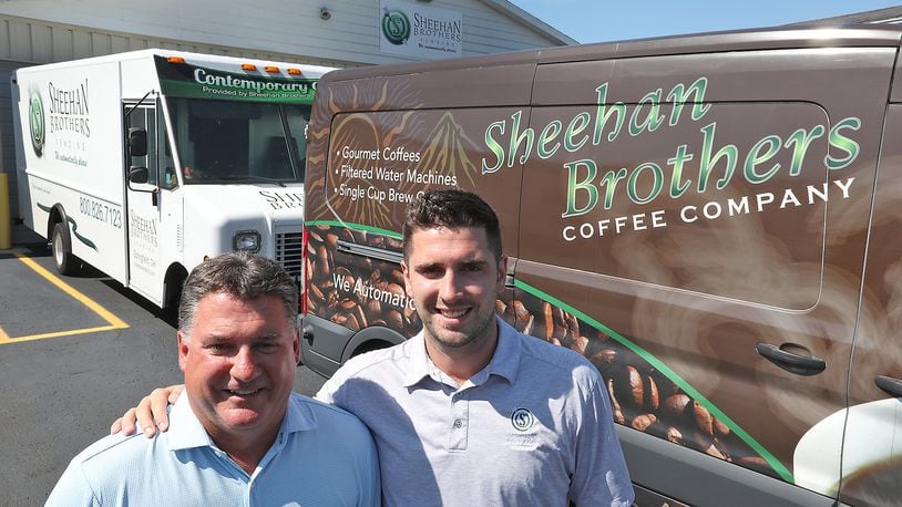 A file photo taken in 2018 featuring owner Dan Sheehan, left, and his son, Patrick, at a time when Sheehan Brothers Vending was looking to expand. BILL LACKEY/STAFF