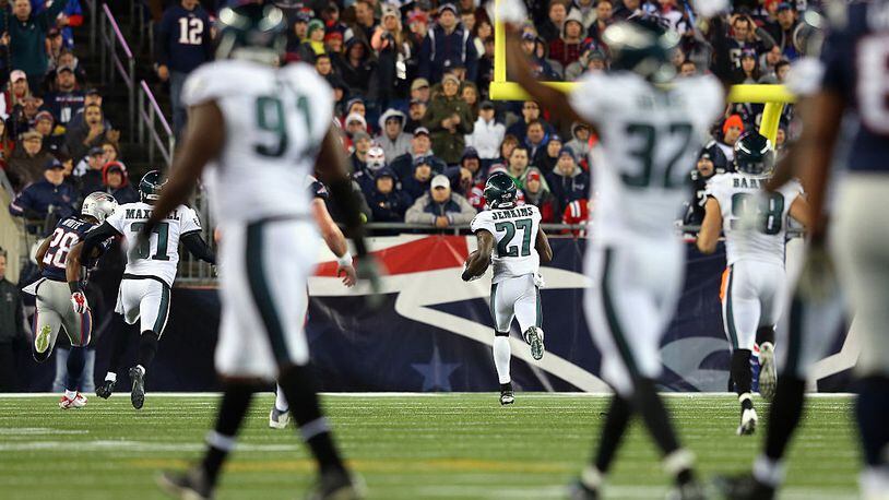 FOXBORO, MA - DECEMBER 06:  Malcolm Jenkins #27 of the Philadelphia Eagles intercepts a pass intended for Danny Amendola #80 of the New England Patriots and returns it for a touchdown during the third quarter at Gillette Stadium on December 6, 2015 in Foxboro, Massachusetts.  (Photo by Jim Rogash/Getty Images)