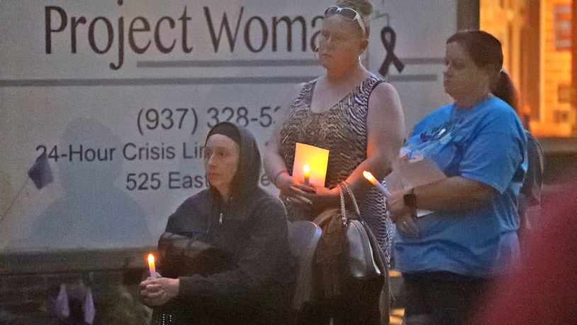 Several events will be held in Clark and Champaign counties this week, including Project Woman's annual candlelight vigil to show their support for the victims of domestic violence. BILL LACKEY/STAFF
