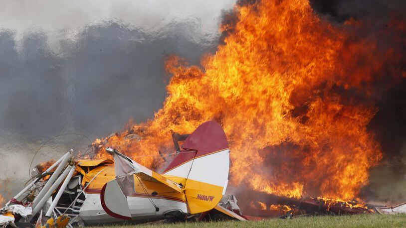 Wing walker Jane Wicker and Charlie Schwenke perished in this crash at the Vectren Dayton Air Show at approximately 12:45 p.m. on Saturday, June 22. TY GREENLEES / STAFF