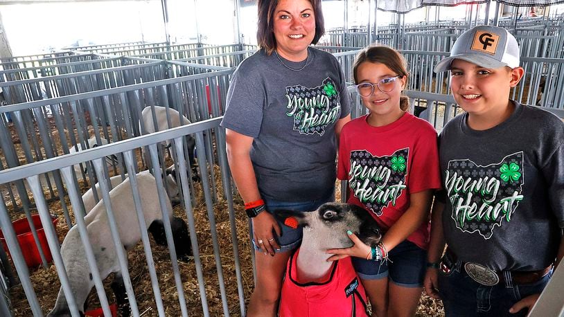 The Clem family has been participating in 4-H at the Clark County Fair for generations and now Heather Clem helps her kids, Hallie and Bentlee, show animal projects. BILL LACKEY/STAFF