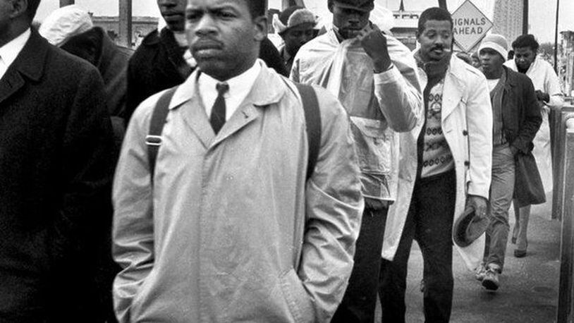 In 1965, Lewis attempted to lead a group of marchers over the Edmund Pettus Bridge in Selma. They were repelled by police officers in what would be known as Bloody Sunday.