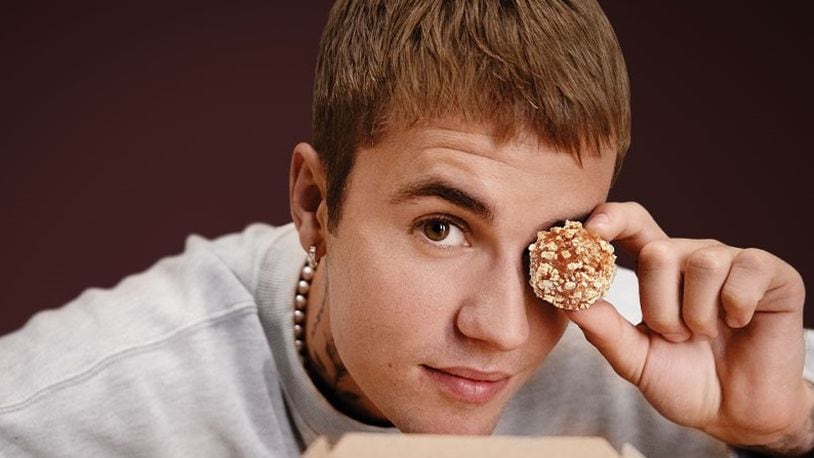 The new, limited-edition menu collaboration between Justin Bieber and Tim Hortons will first be available to customers on Nov. 29 with the launch of “Timbiebs Timbits” in Chocolate White Fudge, Sour Cream Chocolate Chip, and Birthday Cake Waffle flavors.