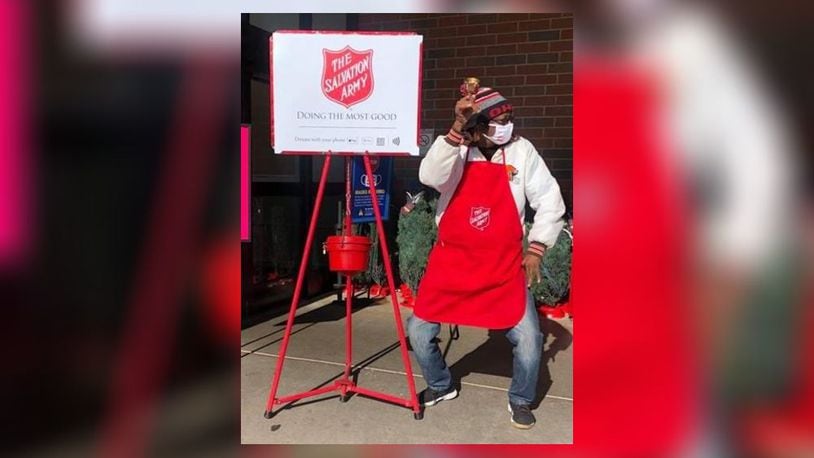 Steven Hunter, a Springfield Salvation Army bell ringer, dances outside of Kroger to encourage residents to donate this holiday season.