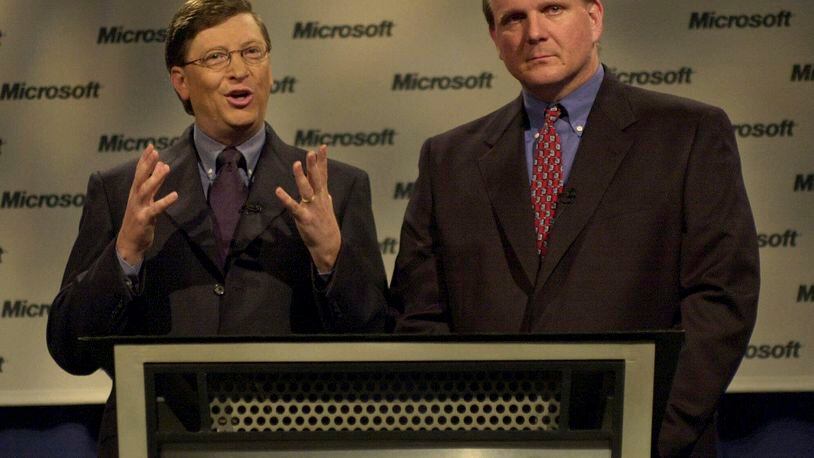 FILE - Microsoft chairman Bill Gates, left, and president and CEO Steve Ballmer speak at a news conference on April 3, 2000 in Redmond, Wash. The U.S. Justice Department's double-barreled antitrust attack on Google's dominant search and Apple's trendsetting iPhone is reviving memories of another epic battle that hobbled Microsoft before it roared back to yet again become the world's most valuable company. (AP Photo/Elaine Thompson, File)