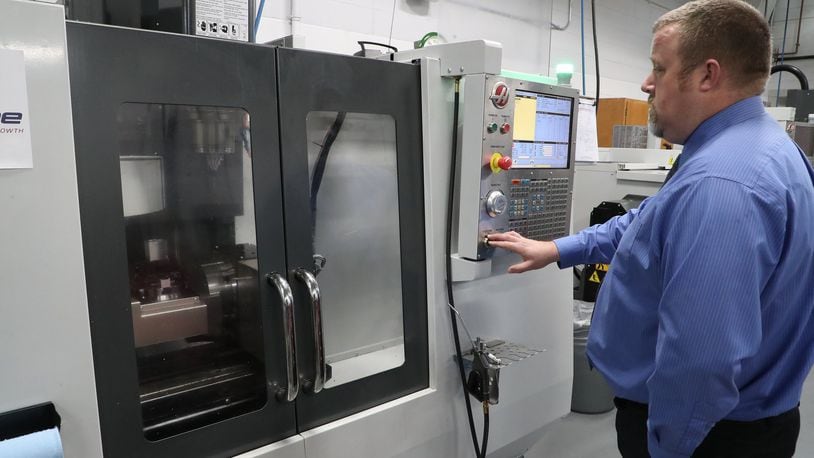 Clark State College has partnered with a manufacturer that operates in Urbana to offer a scholarship program for high school graduates. BILL LACKEY/STAFF
