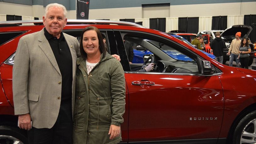 A highlight of the 2019 Dayton Auto Show, held Feb. 21-24 at the Dayton Convention Center, was the chance to win a two-year lease on a 2019 Chevrolet Equinox. The winner was Elizabeth Lauchard; she was congratulated by Joe Johnson of Joe Johnson Chevrolet, who represented the Miami Valley Chevy Dealers that gave away the lease Feb. 24. Contributed photo