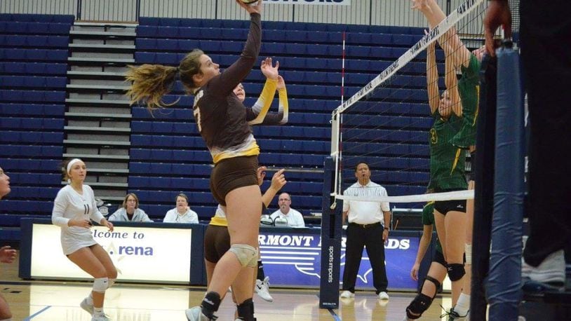 Mikala Morris (7) attempts a kill during a recent match as Dakota White (11) looks on. CONTRIBUTED PHOTO