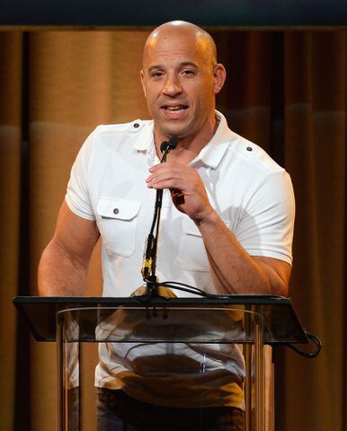 Vin Diesel and brother Paul Vincent: Actor Vin Diesel speaks onstage at the Hollywood Foreign Press Association's 2013 Installation Luncheon at The Beverly Hilton Hotel on August 13, 2013 in Beverly Hills, California.