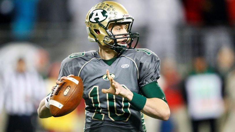 Joe Burrow, pictured here against Toledo Central Catholic in the Division III state championship game in 2014, scored a playoff win over Springfield Shawnee as a sophomore in 2012. Ohio High School Athletic Association photo