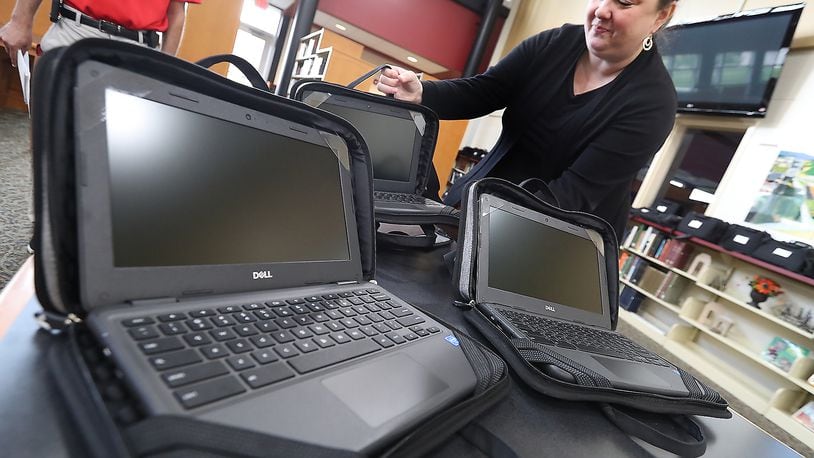 Tecumseh Local School District spent some of their COVID relief funds on hundreds of Chromebooks. BILL LACKEY/STAFF