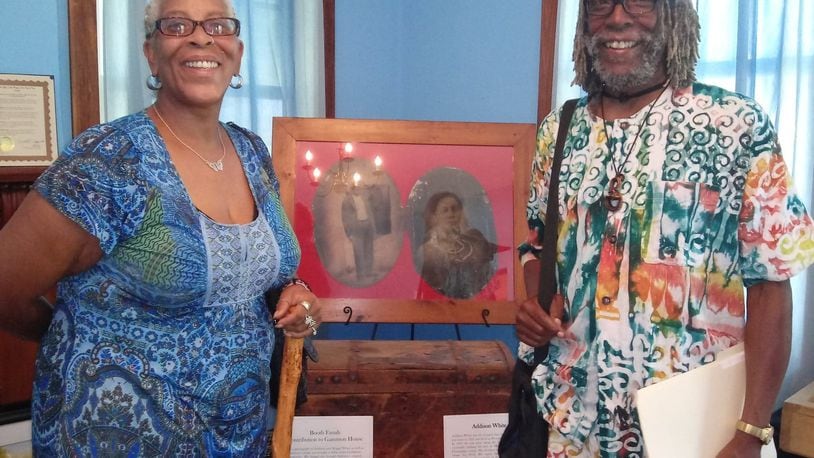 Shari and John Booth, great-grandchildren of Addison White, have loaned portraits of their great-grandparents and their great-grandmothers trunk for display at the Gammon House Museum. Photo courtesy of Malaya Booth