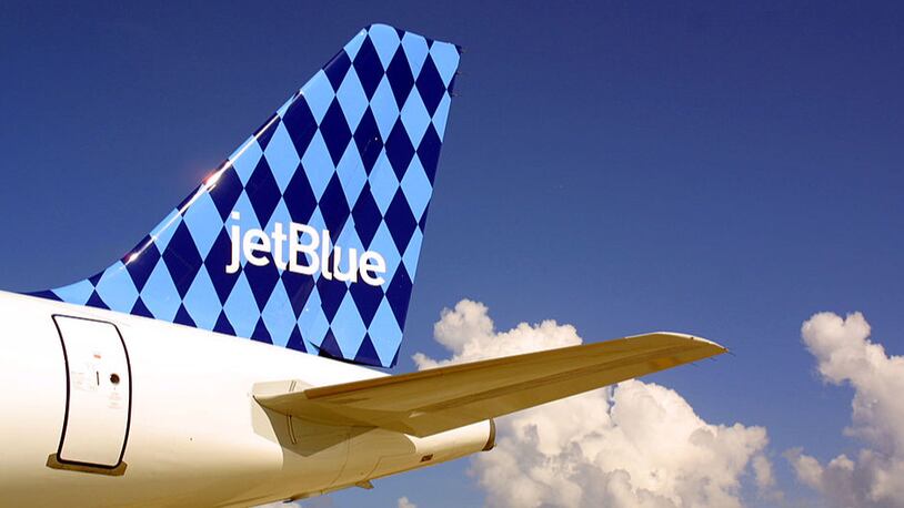 FILE PHOTO: A JetBlue Airways jet sits on a tarmac.