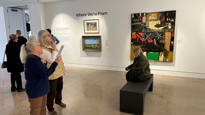 Jackie Potts and Gayle Kencheff take in artwork in one of the new gallery spaces during the Springfield Museum of Art's celebration of its north wing's reopening on Saturday.