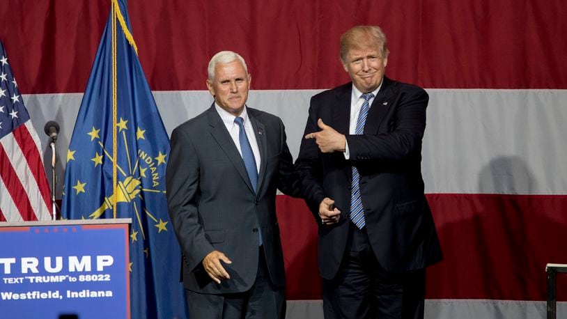 WESTFIELD, IN - JULY 12: Republican presidential candidate Donald Trump greets Indiana Gov. Mike Pence at the Grand Park Events Center on July 12, 2016 in Westfield, Indiana. Trump is campaigning amid speculation he may select Indiana Gov. Mike Pence as his running mate. (Photo by Aaron P. Bernstein/Getty Images)